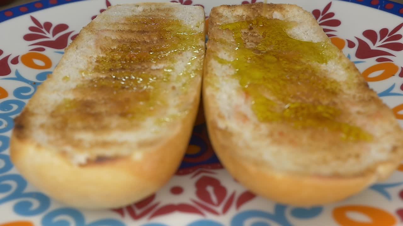 slices of toasted bread with a drizzle of extra virgin olive oil (EVOO)