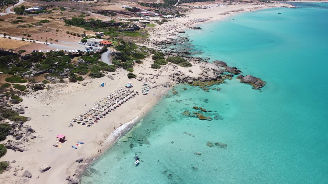 Aerial drone top view video of famous paradise sandy deep turquoise beach of Falasarna in North West Crete island, Greece