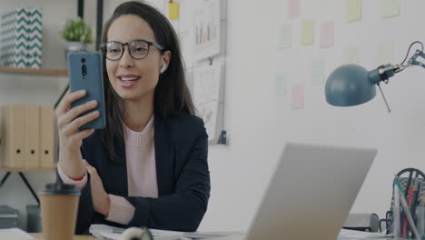 businesswoman on video call in office