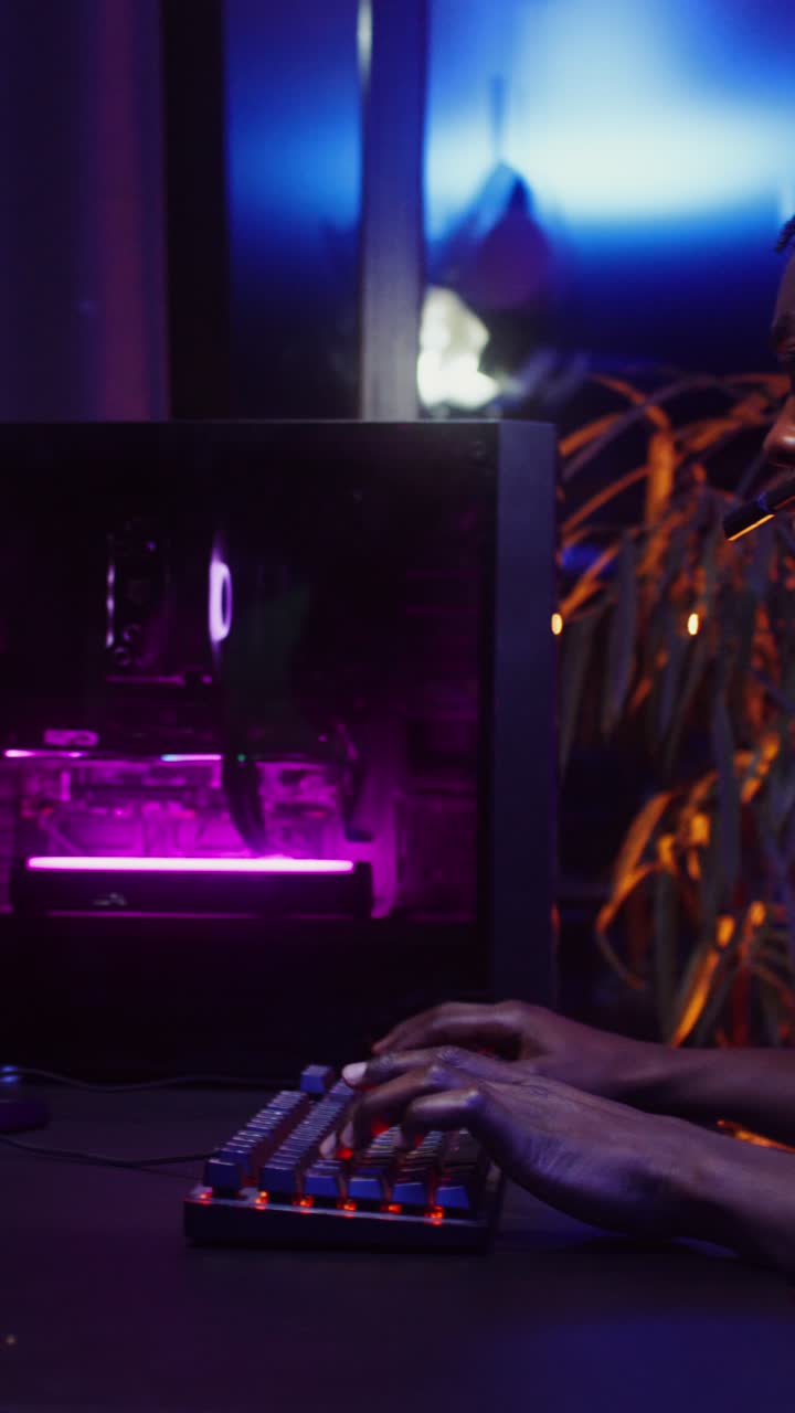 A gamer playing video games with headphones
