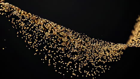 Golden Particles Flowing on Black Background