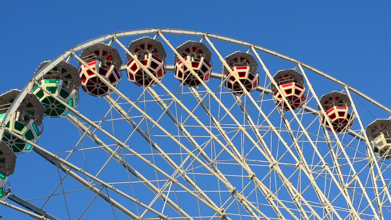Big wheel against the sky. Shooting in the evening
