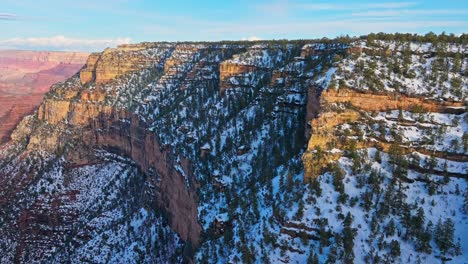 Snow-Covered-Landscape-Of-The-Grand-Canyon-In-Arizona,-USA---aerial-drone-shot