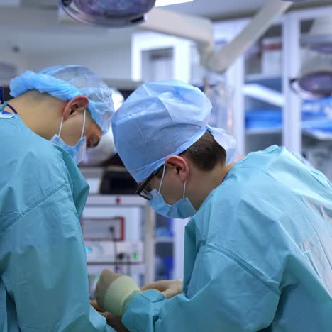modern equipment in operating room. medical team performing operation