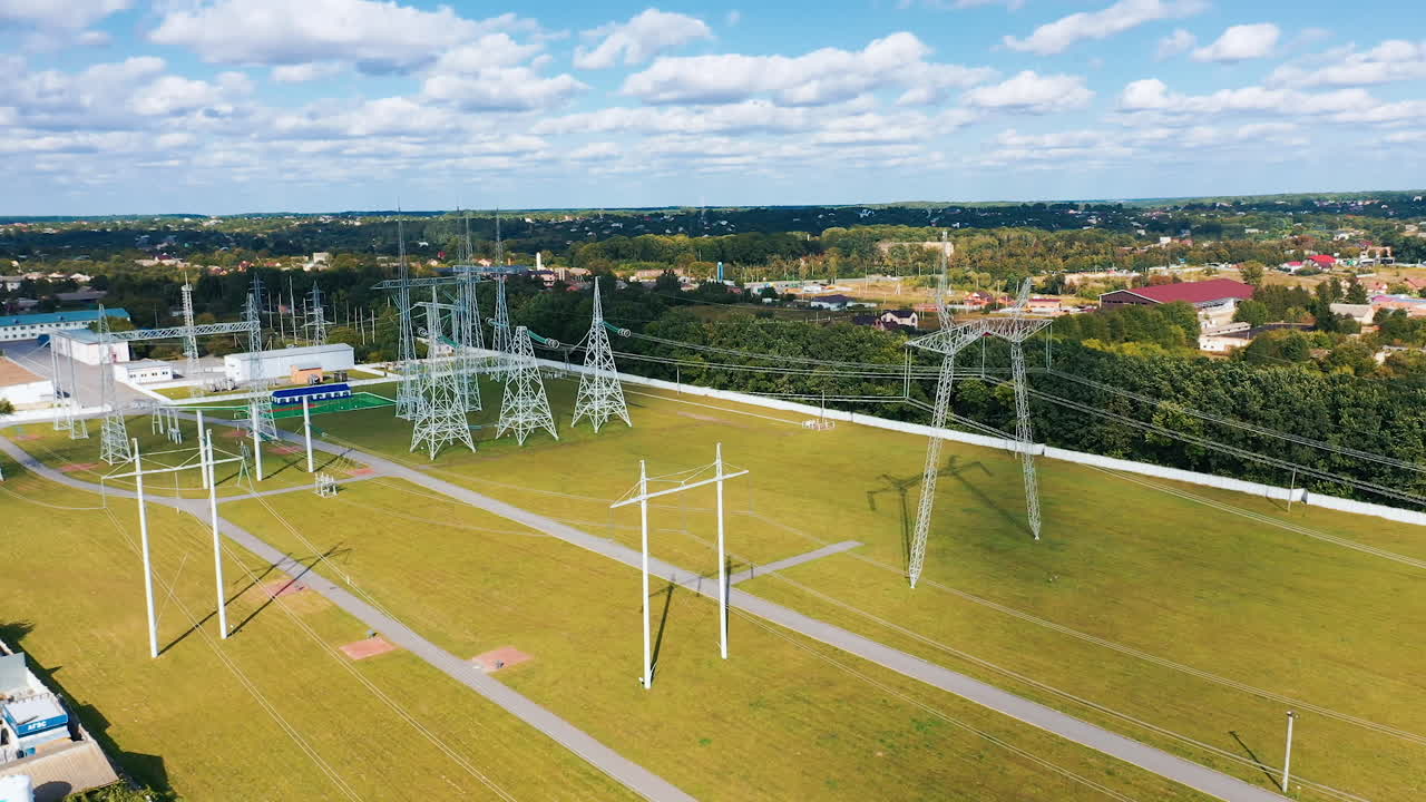Aerial view of electrical voltage wires. High voltage tower electricity station.