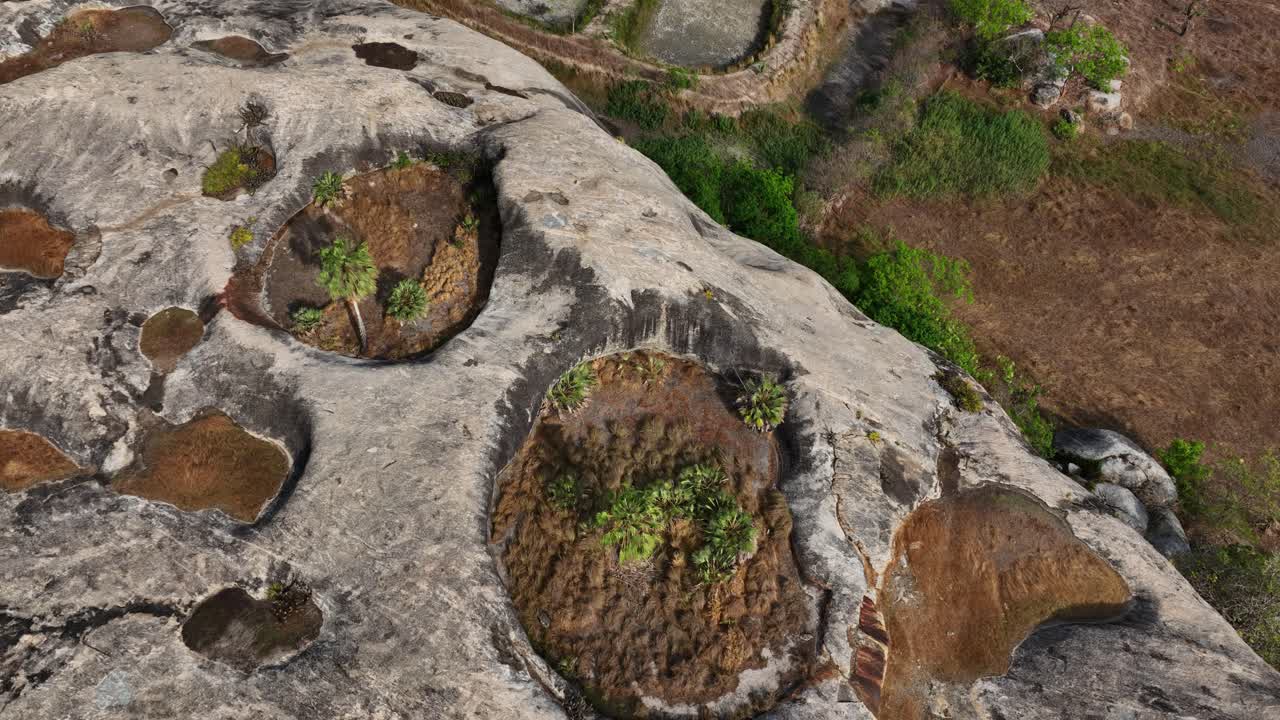 Vegetation in round rock formations in Ceara, Brazil, aerial push-in