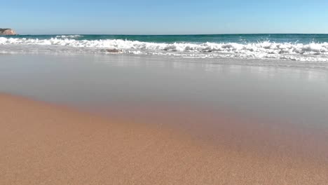waves crashing on the beach, slowmotion