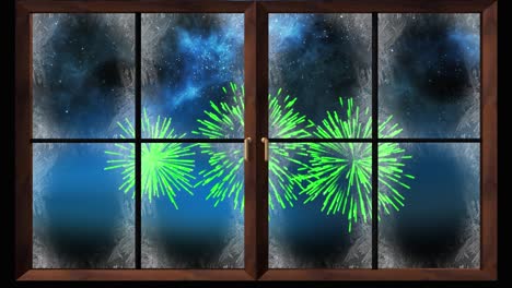 Animation-of-window-and-snow-with-green-christmas-and-new-year-fireworks-exploding-in-night-sky