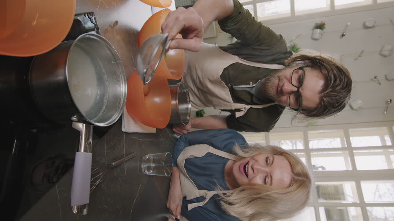 Young Man Cooking Poached Egg