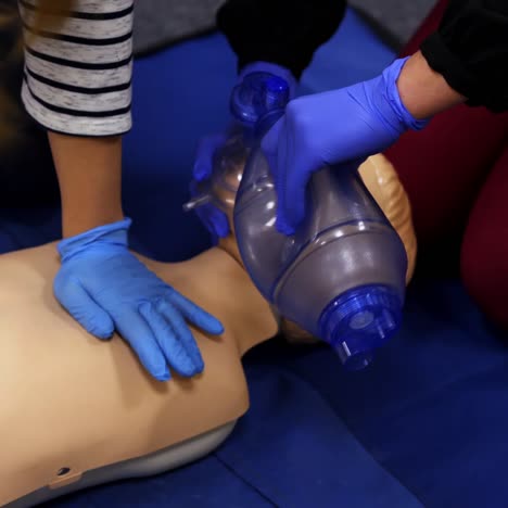 cardiopulmonary reanimation. training course of giving first aid on a dummy. medical demonstration on a mannequin doll.
