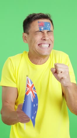 man cheering for australia during a match that is lost