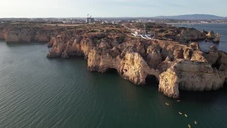 Aerial-view-of-Ponta-da-Piedade-rock-formations-in-Lagos,-Portugal