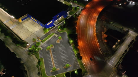 high angle view of illuminated infrastructure at shopping park at night