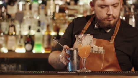 bartender preparing a cocktail