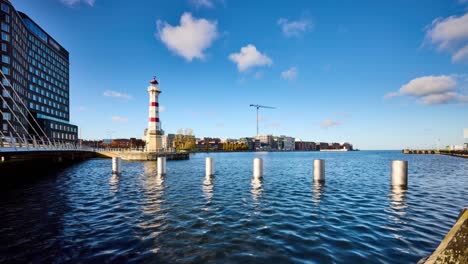 malmo harbor lighthouse timelapse. sweden