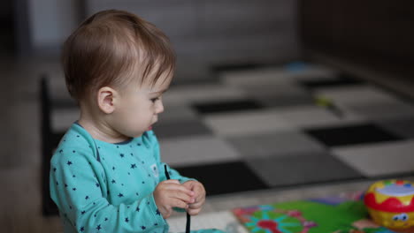 baby playing with toys at home