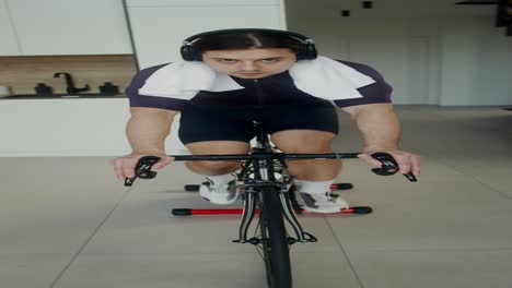 man working out on an indoor cycling machine