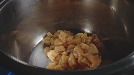 Raw-Fresh-Chopped-Chicken-Breast-Being-Dropped-Into-Metal-Bowl-Followed-By-Chopped-Cauliflower-And-Cabbage