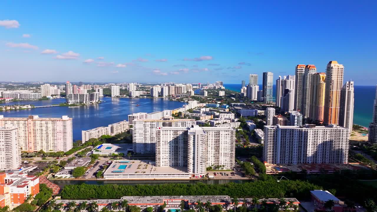 High-resolution aerial footage showcasing the coastal skyline of Sunny Isles Beach and Hallandale Beach, Florida