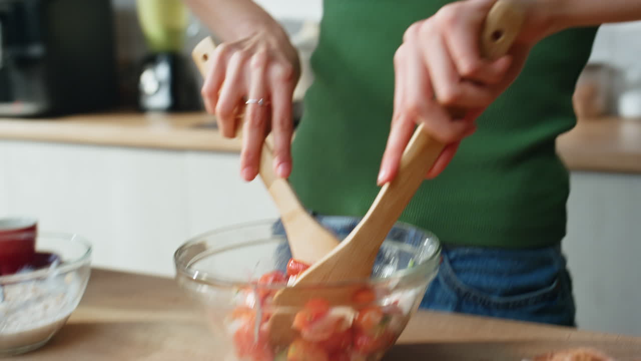 Woman talking on the phone in the kitchen