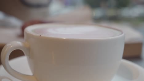pink latte in a cafe
