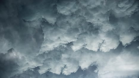 view from above thunderstorm and moving dark clouds, 4k lightning hurricane