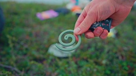Hand Holding Mosquito Coil And A Lighter. - closeup shot