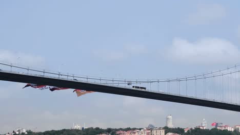 transportation traffic on istanbul bosphorus bridge with cars and bus over sky in istanbul, turkey