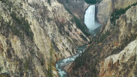 the grand canyon of yellowstone national park lower waterfall with raging river through the canyon