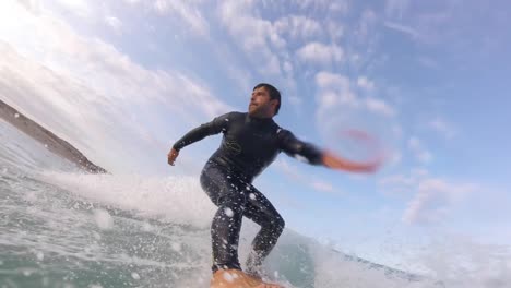 young man teen surfer surfing small ocean wave attacking off the lip