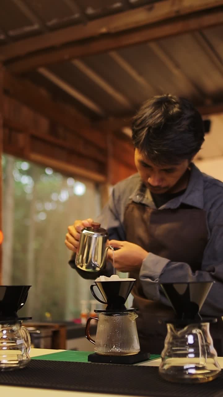 Man preparing pour over coffee