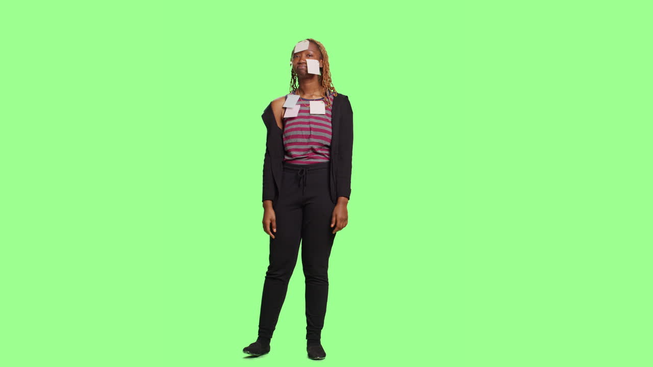 Woman with sticky notes on her face and body