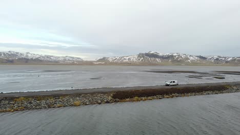 car driving on beautiful road, travel background, aerial scenic landscape from iceland