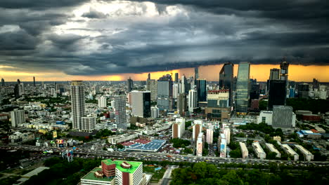 bangkok skyscrapers and highway traffic with storm over city, drone hyperlapse