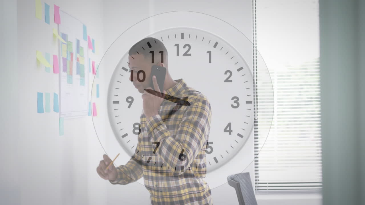 Talking on smartphone, man in office with clock animation overlay