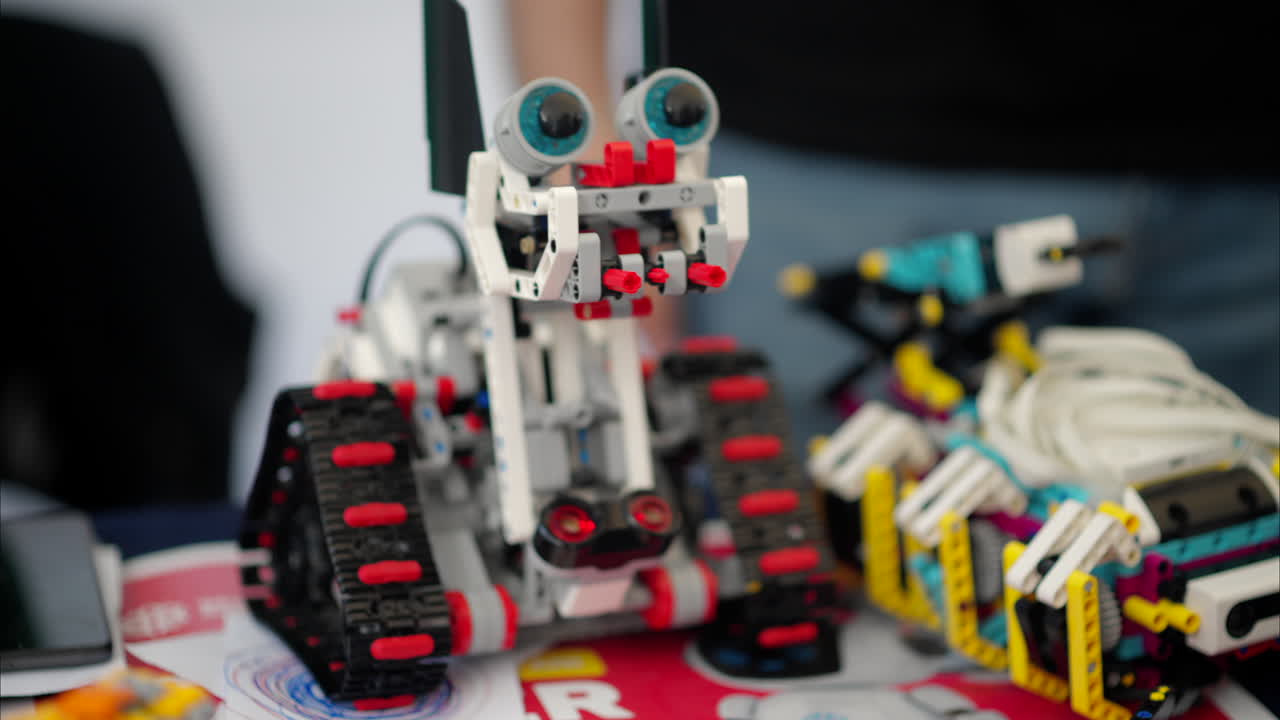 Man analysing a moving robot, slow motion