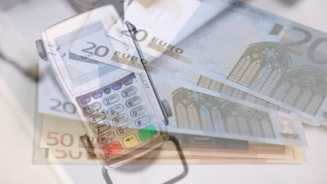 animation of euro banknotes over payment terminal