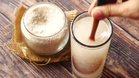 preparing dough by mixing flour and water