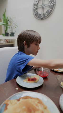 child eating breakfast, person getting haircut at home