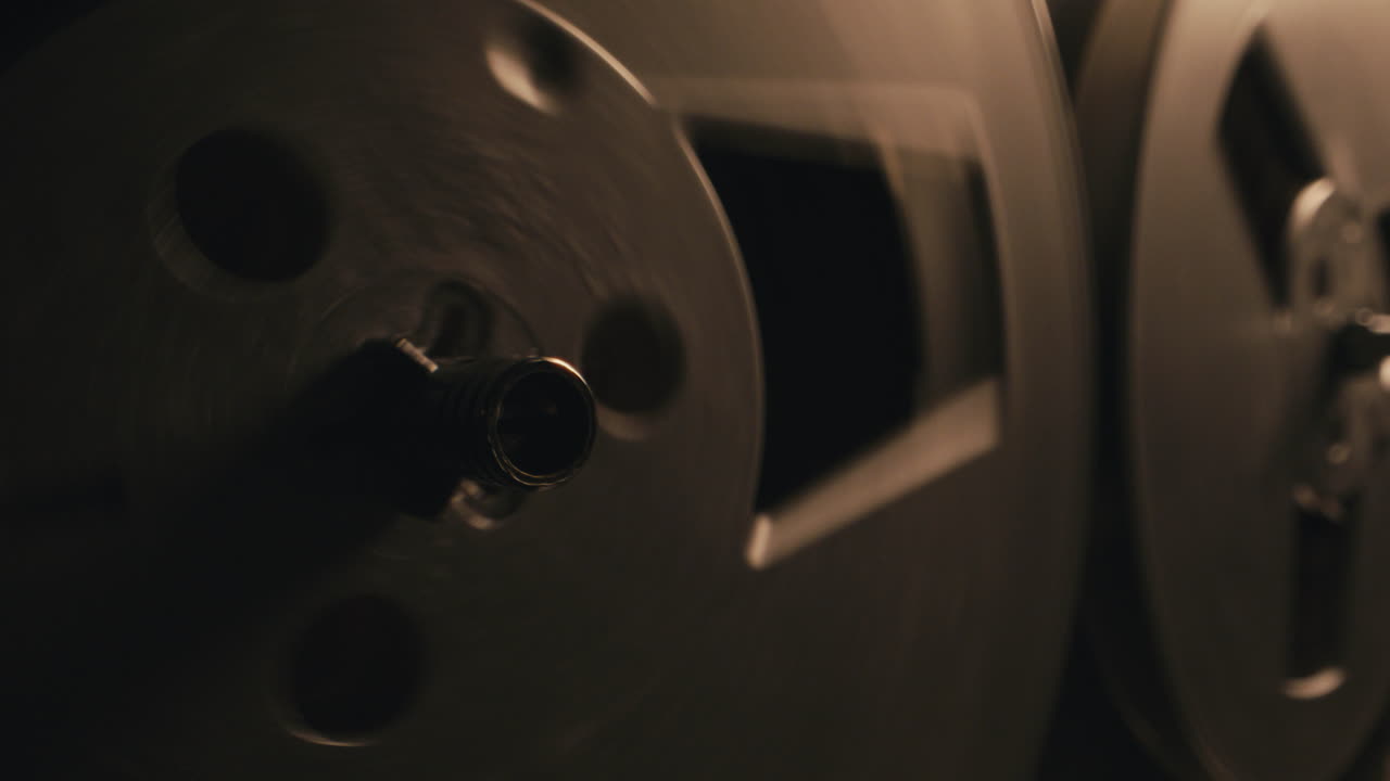 A vintage tape recorder in a blinking light