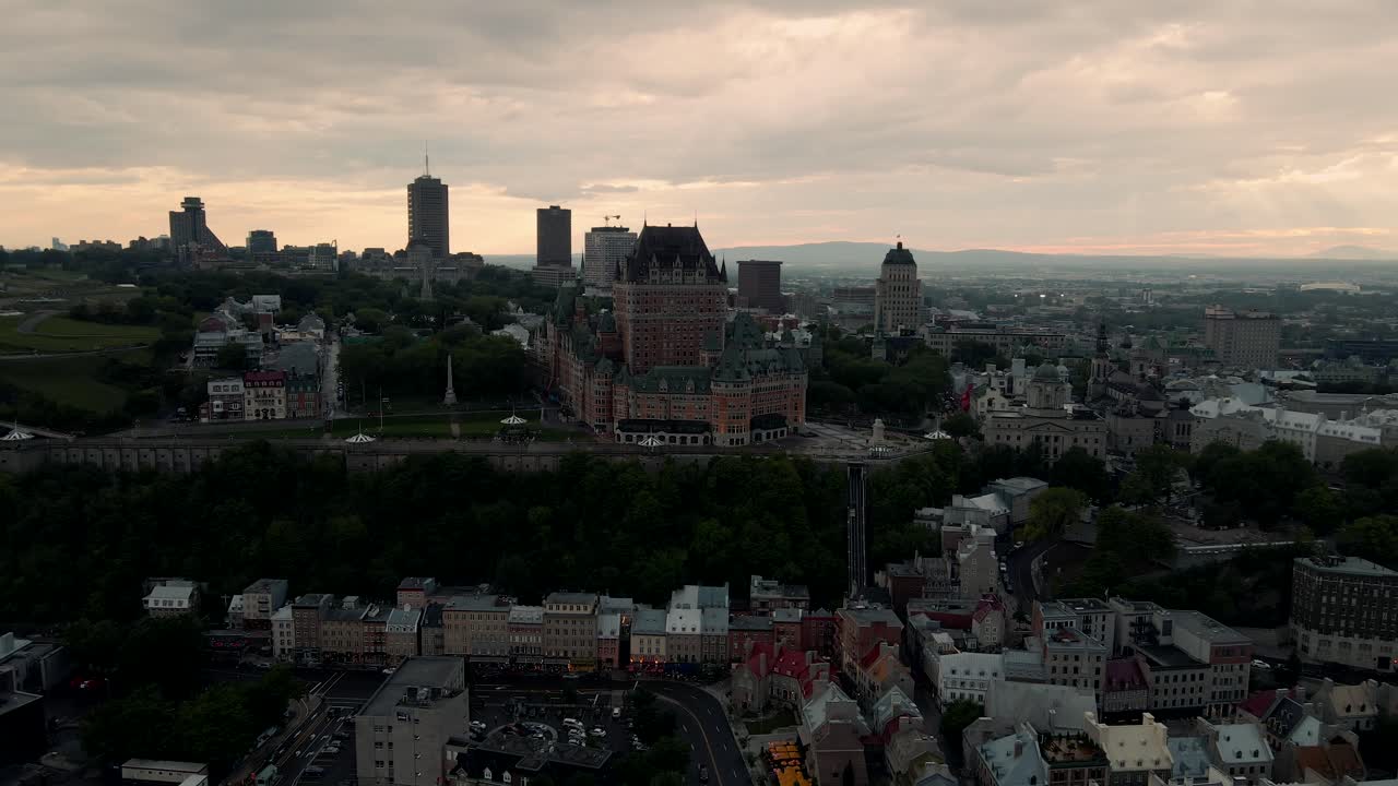 View of the luxurious Hotel Fairmont le Chateau Frontenac in old Quebec City at sunset, Aerial