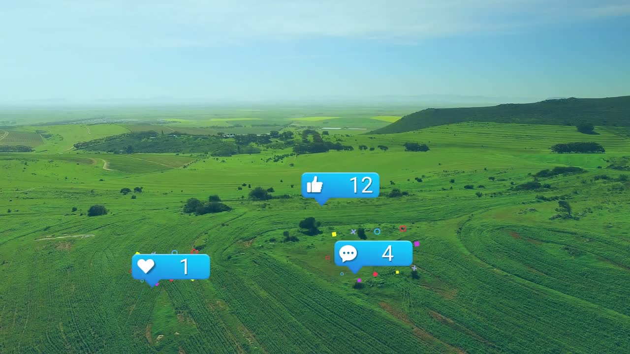 Starting aerial sweep over farm, blue notification icons drifting and growing showing engagement