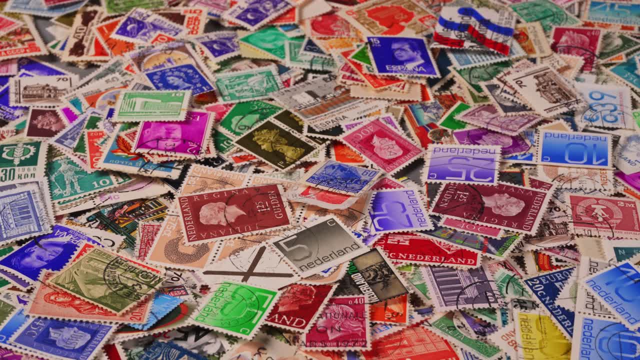 Stamps from different countries arranged on a table