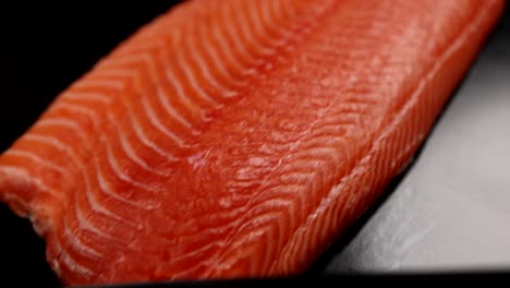 cutting fresh salmon