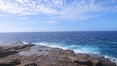 Powerful-Pacific-Ocean-showing-its-power-while-hitting-volcanic-rocky-shore-of-island-Oahu-at-Hawaii