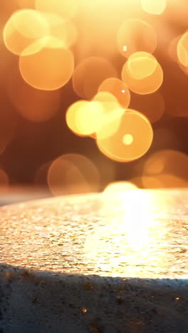 a round object with a sun shining on it. the sun is casting a shadow on the object