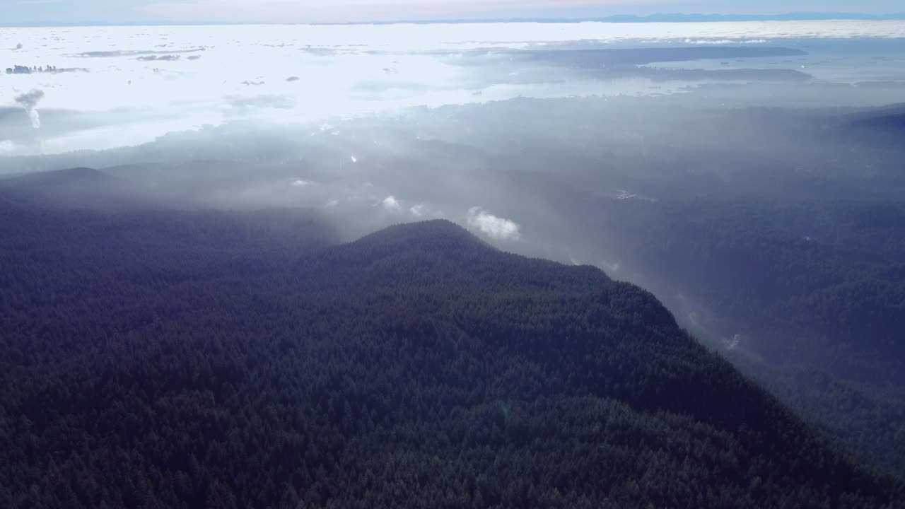 Aerial View of Misty Mountains above Vancouver, Canada