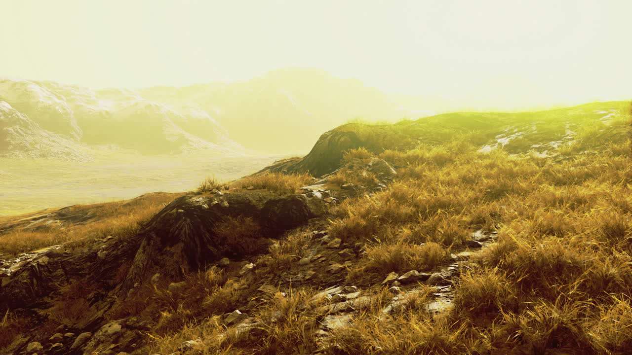 Golden light over rugged terrain in a remote mountainous area