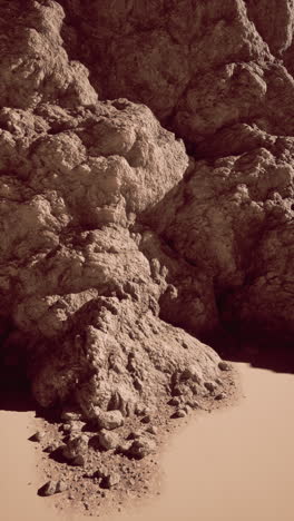 rock formation amid desert sands