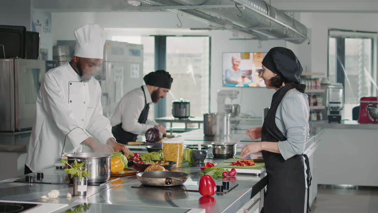 Diverse team of chefs teaching gastronomy on cooking show